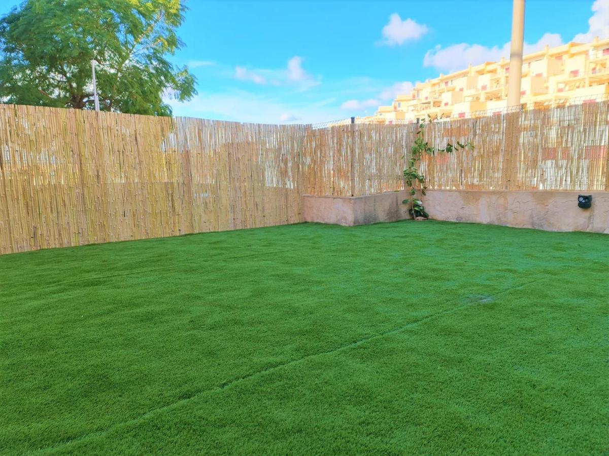 Espacioso Apartamento Con Preciosos Jardines Y Bbq Isla Plana Exterior foto